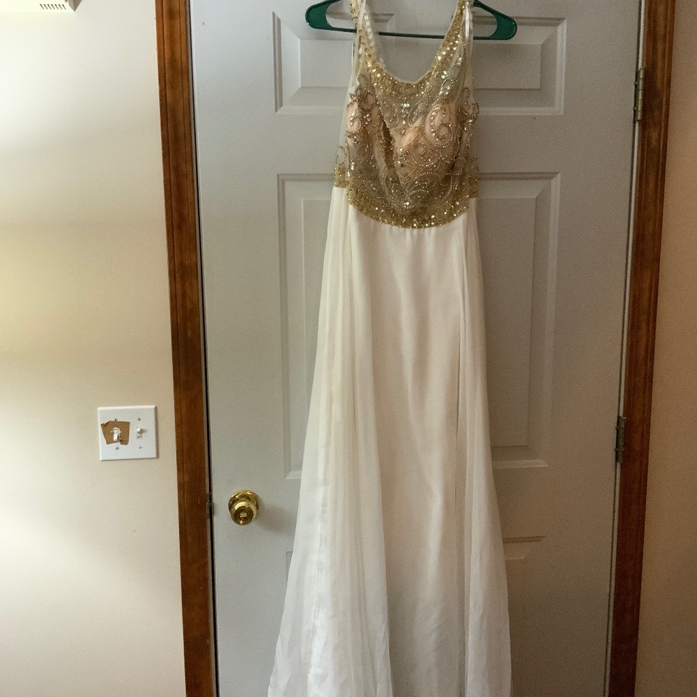Gorgeous cream jeweled prom gown